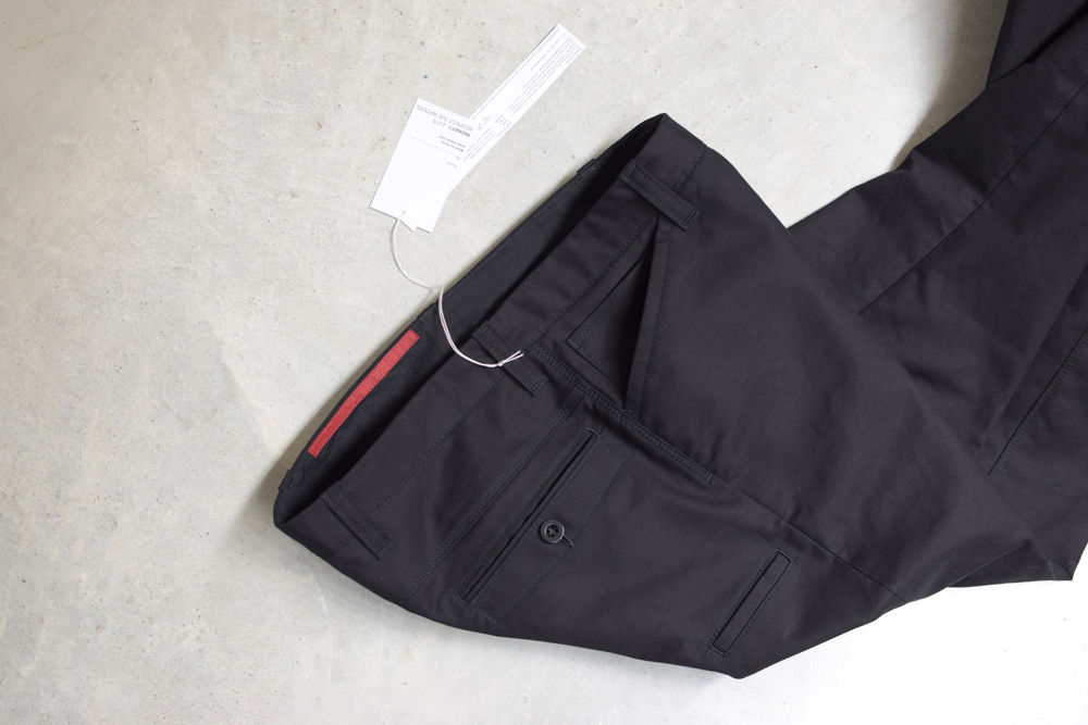 pocket details, black organic cotton trousers with handy - pocket, piped rear pocket.