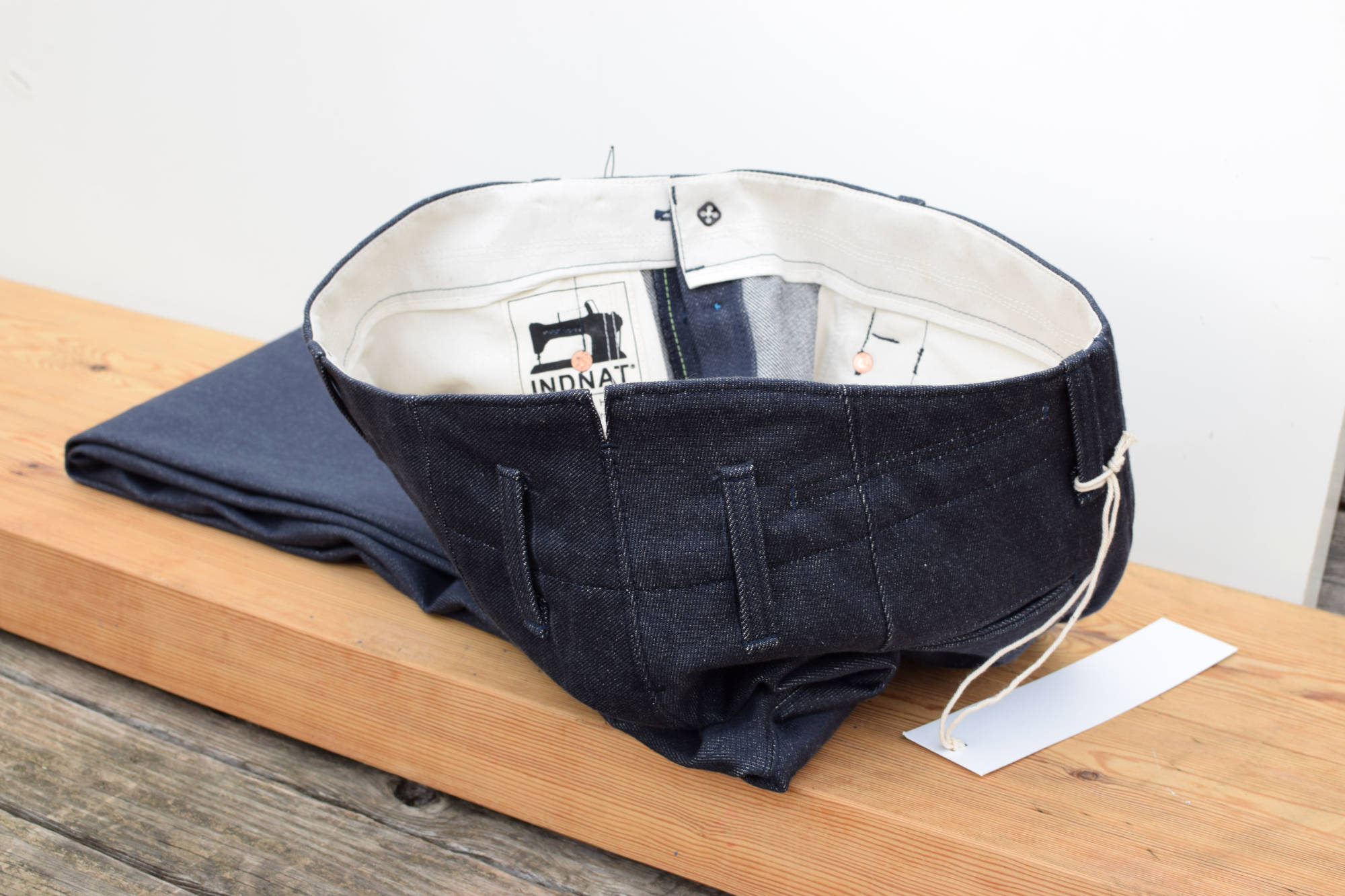 Raw Denim Jeans in Indigo Blue made of 50% Organic Cotton 50% Recycled Cotton by Manufacture Metis, France.